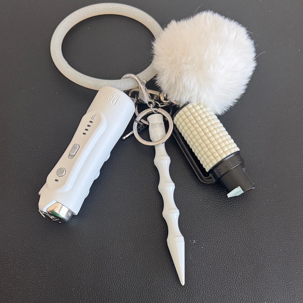 Damsel in Defense White Pom Pom Comfy Wrist Keychain with Personal Safety Tools